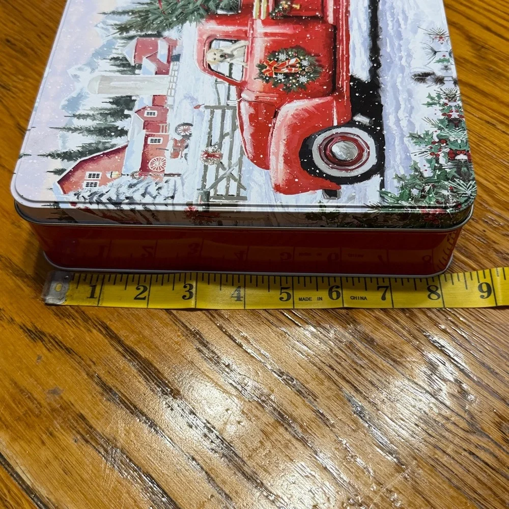 Christmas Scene 300 piece puzzle in a collector tin.  Originally a cookie tin.
